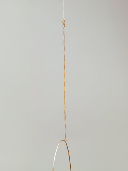 Suncatcher suspendu en verre et en laiton